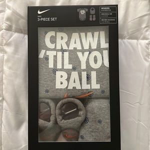Nike new 3 piece set onesie booties and hat. Gray